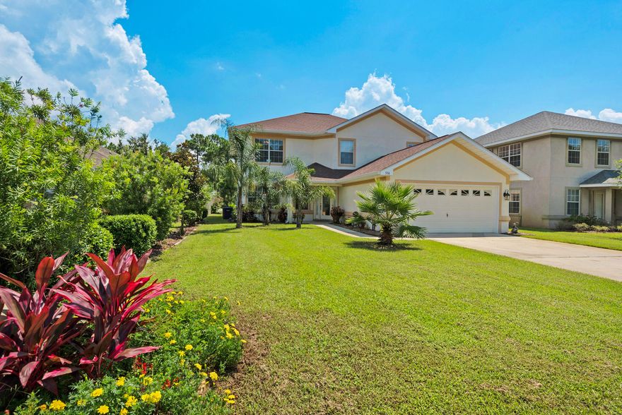 Exceptionally maintained 2 story home in the highly sought after community of Driftwood Estates! Only minutes to the beach, shopping, hospital and local attractions, this centrally located property will not last long. Upon entry, you are greeted by the expansive family room which includes a formal dining area surrounded by windows allowing for plenty of natural light. The large kitchen with newer appliances opens up to the living room boasting a fireplace making this space perfect for entertaining plenty of guests. The first floor also features a full sized bedroom and bathroom. Directly off the main living area is the outdoor screened in lanai overlooking the lush landscaping.