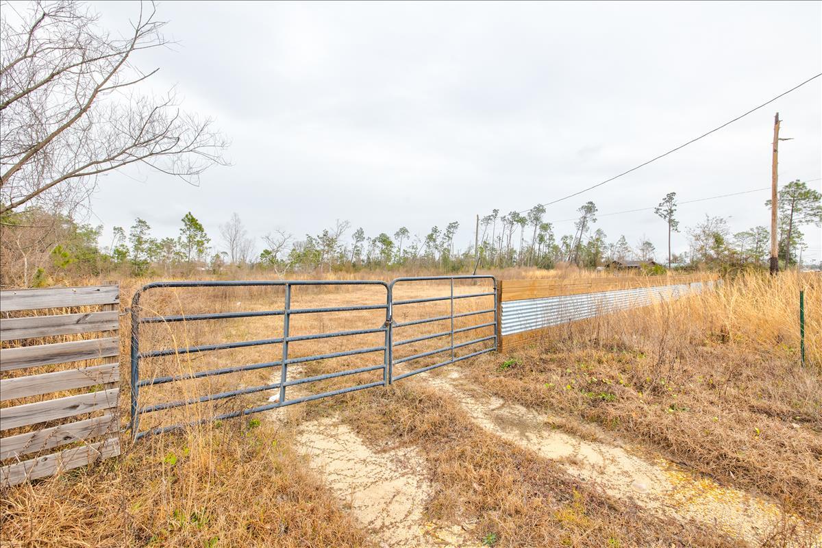 Looking for your dream lot? Look no further! This gorgeous property sotting on almost 3 aces of land features a spring fed pond, 2 fenced in pastures, and a shed. Yes heard right spring fed pond! Let your imagination run wild in create your dream property. No HOA here. The Skys the limit. Electric, a well, and septic in place. Don't miss your chance to own a piece of paradise.