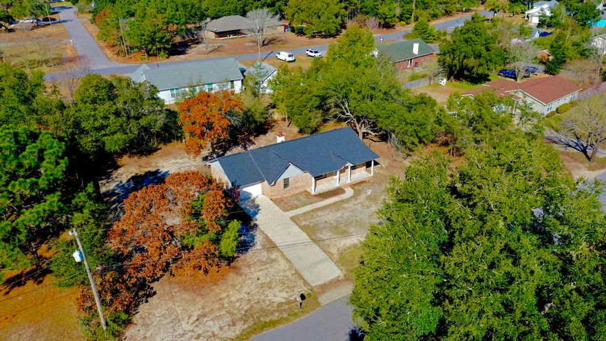 New Roof 2023, New HVAC 2023, entire home freshly painted, new light fixtures/ceiling fans, new granite counter tops in Kitchen, new cabinets, new sinks, new LVP flooring, New exterior doors, new garage door and opener, new bath fixtures, toilets, etc. All updated and ready to move in. Brick (wood burning) Fireplace. No HOA, large lot recently cleared and is partially fenced.