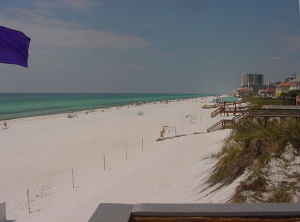 Hidden Dunes Beach And Tennis Resort ''Cotttage'' Unit. The resort refers to them as the cottages. This 2 bedroom 2 full bath condo is a second floor entry. The loft is a second full bedroom and bath. Both bedrooms have a king size bed. Kitchen cabinets and wood vinyl faux flooring have been updated. Windows have been replaced.New draperies. Carpet and sofas are two years old. All furnishings remain. Pool view screened patio.