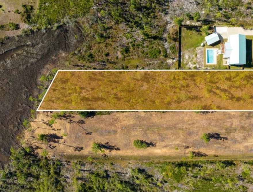 Discover the perfect blend of serenity and convenience on this 1.2-acre land parcel in the coveted Laird Bayou community. Nestled along the pristine waters of Laird Bayou, this property stands as one of the few with the rare privilege of being dock able, offering direct access to boating and water adventures. Laird Bayou is known for its tranquil and friendly atmosphere, making it an ideal place to build your dream home. Despite its peaceful ambiance, you're just minutes away from an array of shopping and dining options, ensuring you have all the essentials within easy reach. As a resident of Laird Bayou, you'll also enjoy access to community amenities that include a refreshing pool, a convenient bath house, and even RV/boat storage facilities.