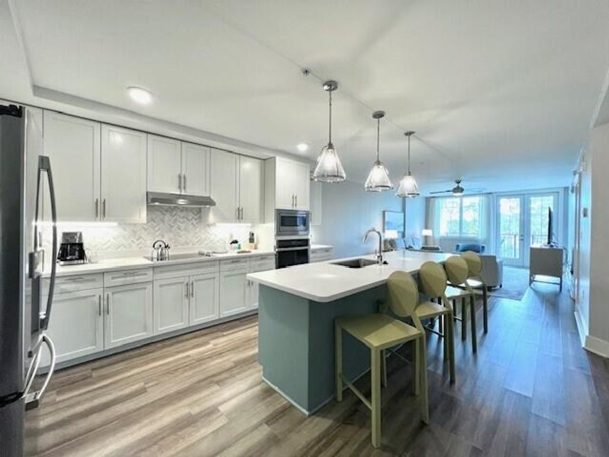 FULLY FURNISHED WITH ALL UTILITIES INCLUDED! Beautifully furnished 2 bedroom, 2 bath condo with a spacious open floor plan boasting 1,260 sq ft. The condo has a fully equipped kitchen, large pantry, full-size washer & dryer, and private balcony. Notable features include Quartz countertops, stainless steel appliances, soft close drawers & cabinets, and luxury vinyl flooring throughout. Osprey Pointe offers a zero-entry pool & The Village of Baytowne Wharf is just a short walk or drive away with several fantastic restaurants, retail shops, and fun entertainment options. Come relax & enjoy the luxurious resort lifestyle! **Date of availability is approximate & subject to short-term rentals. Photos may not be of the exact unit but furnishings & finishes throughout the condo are the same.**