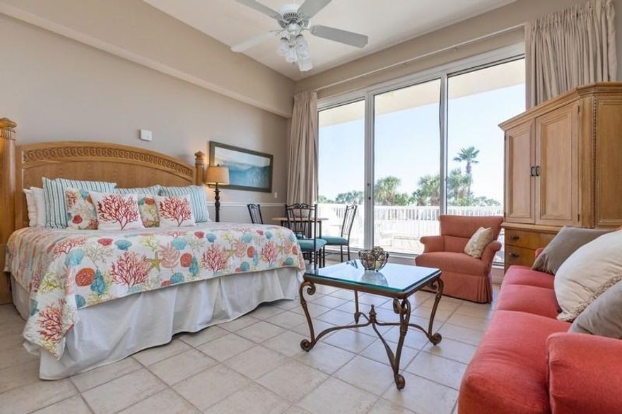 This studio unit on the 2nd floor is perfect for those who want the convenience of walking directly to the beach and pool without waiting on an elevator. The condo has 11 ft. ceilings with a wall of windows, tile flooring, full kitchen with stainless steel appliances, bath with walk in shower and a large fenced patio area. There is a king size bed and a queen sofa bed to maximize sleeping space. This studio unit does very well as a vacation rental. Or, if you are a current owner at Silver Shells and simply need more space for your overflow guests, be sure to look at this condo. You can enjoy all the vast amenities at the Silver Shells Resort, including 1000 ft. of gorgeous white sand beach at a very affordable price and remember, all utilities, even electricity, are included in the
