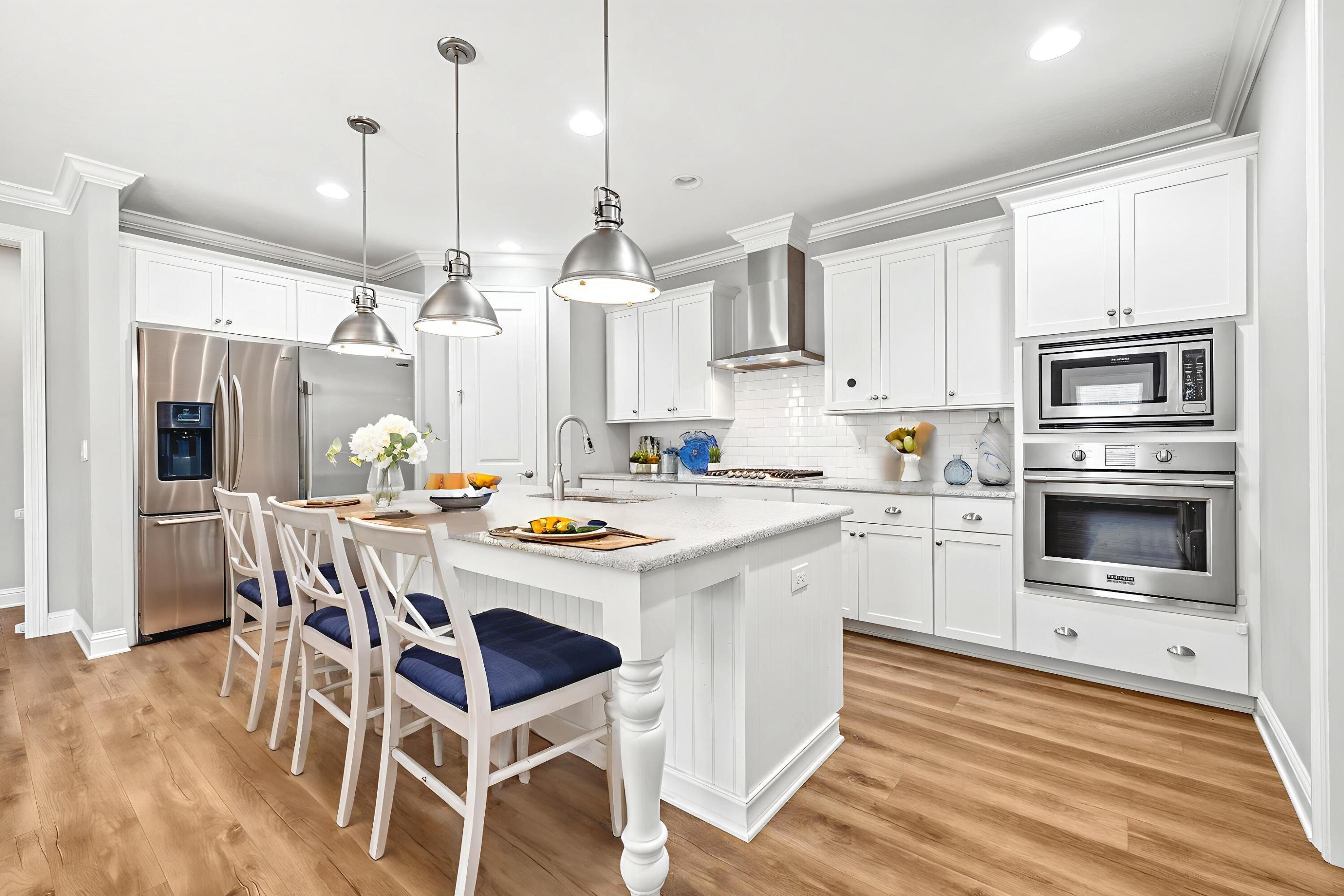 Tired of builder grade constructed homes that all look the same? HIGH QUALITY CONSTRUCTION W/$33,000 LUXURIOUS UPGRADES!! ... SET THIS RANDY WISE BUILT HOME ASIDE FROM THE OTHERS. Through the elegant foyer, 9 ft, knockdown lace ceilings adorned w/crown molding, large, trimmed out windows & openings, and 8 ft doors RADIATE QUALTY! Enjoy thoughtful living spaces including a spacious Great Rm w/built in cabinetry & TV bracket above, & awaken your productivity in the roomy home office adorned w/French doors. The gourmet kitchen, featuring a 66-inch Frigidaire Professional series refrigerator, 5-burner gas stove, built-in convection oven, large, custom pantry & sizable island w/stunning Quartz counters, awaits your culinary adventures. Located in its own wing, experience privacy in your Master suite and you'll never want to leave your luxurious Master bathroom w/custom walk-in shower with dual shower heads, an ADDITIONAL majestic rainwater shower head, a warming heated towel rack, and an expansive custom walk-in closet which conveniently accesses the laundry room! Other features include higher end LVP flooring, custom light fixtures, double master bathroom doors, custom shower in 2nd bathroom w/upgraded shower head, granite topped charging station as you enter house from garage, and tankless HWH.
Relax in your screened porch overlooking the charming paver brick back patio which has extra power outlets for string lights etc.. Outside, immerse yourself in tranquility with professionally landscaped, low-maintenance yard encapsulating new sod, blooming flower beds, and mature shrubbery.... The perfect atmosphere for al fresco dining/summer BBQs! This home is fully outfitted as an Alexa/Google Smart home for your comfort and convenience. An oversized 2 car garage w/a dedicated circuit outlet for a freezer & meticulously integrated gutter system complete the outdoor aesthetics. For the community enthusiast, Hammock Bay offers enticing amenities, including multiple pools, a fitness center, sports complex, a bay front clubhouse, and miles of serene walking trails. Experience an enriched lifestyle with $33,000 of Randy Wise luxurious upgrades without the premium tag! Arrange a private showing and make the everyday extraordinary.