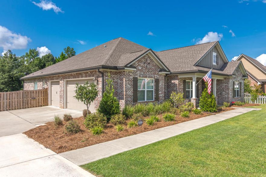 In the heart of Baker! This gorgeous all brick home with 4 bedroom 3 bath greets you with a beautifully landscaped walkway and covered front porch. This detail oriented home boasts crown molding, recess lighting, 5 panel doors and gorgeous rustic laminate flooring. Massive farmhouse style kitchen ready for your chef in the family and perfect for entertaining. This kitchen boasts double islands, double sinks (prep sink), granite counter tops, oiled rubbed bronze package, white shaker cabinets with soft-close, under mount lighting and stainless-steel appliances. Huge grand master suite, big enough for a sitting area! Master bath features his and hers individual oversized double vanity sinks and garden tub for relaxing after a long day! Calgon take me away!