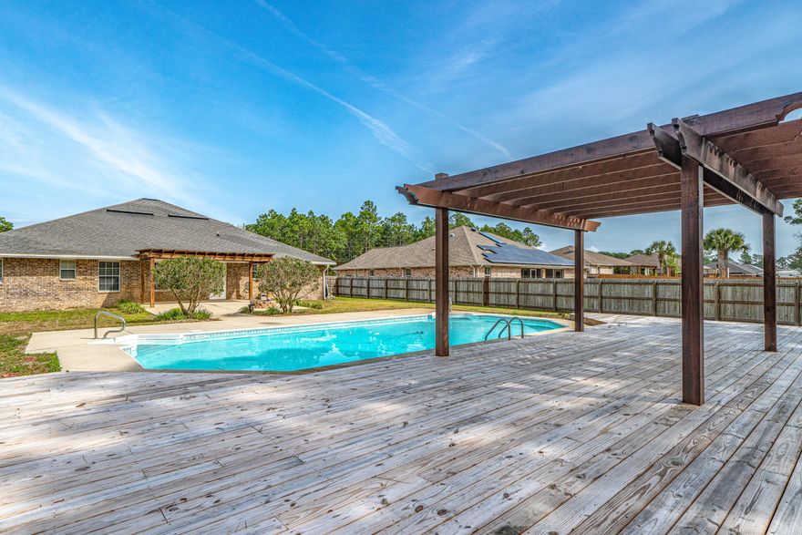 Welcome home to this gorgeous, updated 5 bedroom pool home in the amazing Holley by the Sea community! Well designed split floorplan layout and enormous backyard will check all your boxes! As soon as you approach this home you will fall in love with the large front porch and beautiful palms. Upon entering you will immediately notice the large entryway and many updates. Fresh paint, new carpet, updated kitchen and bathrooms, no popcorn ceilings, all stainless steel appliances, granite and backsplash, brand new HVAC, updated fans, master bedroom closet built-ins, and the list goes on! But the real charm of this home is the amazing backyard with private pool, covered patio with fan, workshop/yard building, and the most fabulous patio deck you've seen! Ready for summer?! Oh yes it is!