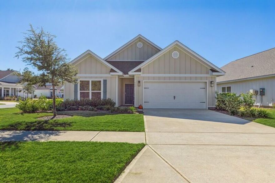 Check out the photos!  Some rooms have been updated with additional photos now that the home is vacant!Motivated Sellers!! You don't want to miss out on this gorgeous 4 bed/2 bath home built in 2021.  It is located on a beautiful corner lot in the gated Firefly neighborhood within Hammock Bay! These motivated sellers are offering $2,000 at closing with an acceptable offer!With over 2,000 square feet of living space, the Delray model offers its owners the privacy of a split floorplan.  In the heart of the home, you will find plenty of room for entertaining with the open concept kitchen, living room, dining area, and newly added screened-in back porch.  The kitchen comes complete with a large island, beautiful granite countertops, a separate corner pantry, and stainless-steel appliances.