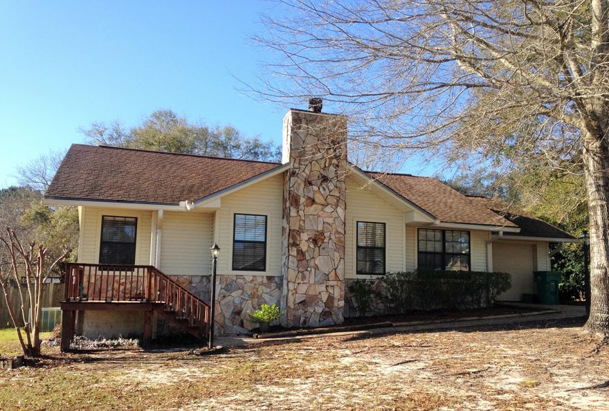 Great 3bd/2ba home with tons of charm. The home features a stone fireplace, new laminate and tile flooring and new carpet in the bedrooms. Living room and dining area are large and open, Tongue-n-groove cathedral ceiling in the living room welcomes you home! Indoor laundry room. Garage has been converted into an office (sq ft not reflected but is heated/cooled), and the garage is large enough to store motorcycles, etc. The backyard is large and flat! New appliances. This listing is turn key and clean!