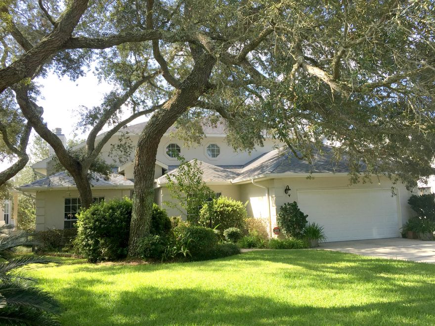 Absolutely stunning 4 Bedroom, 3 Bath home that sits high on a hill in exclusive Lake Lorraine Gardens. As you enter this custom built home, you can see the one owner love. The open kitchen is the heart of this home with plenty of room, cabinets, and storage for the chef in the family. Sunken living room with fireplace offers plenty of room for all of your guests to sit down by the fireplace. Beautiful in ground sparkling pool, screened in with plenty of room to lounge pool side. Work your way outside through the landscaped yard for more views all the way to Destin Bridge!!! Wind your way up the staircase to two more of the bedrooms. The master bedroom on this floor boasts plenty of room, views, and a see through fireplace that connects to the master bathroom area. Just minutes from Shalimar Pointe Golf Club and more!!  Call for a private showing today.