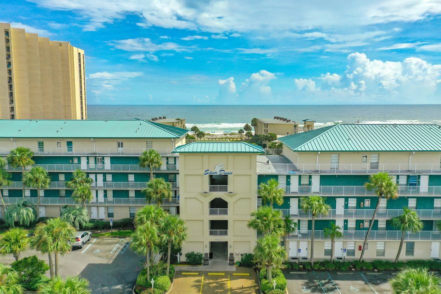 Tremendous reduction for a quick sale! Offered AS-IS - FIRM.  Only 3 bedroom, 2 bath CORNER unit available and it presents light and bright! Great beach views from the balcony of the white sandy beach of the Gulf of Mexico. Unit has been owned by one family since it was built and has never been a rental. Enjoy plenty of balcony space for large entertainment. Unit has arched door ways and all bedrooms are spacious. Located in the heart of Destin, Silver Dunes offers 8 acres of gulf front property, a huge green space for children to play, not just sun and sand. Generations of families have loved Silver Dunes and share wonderful family memories. Start sharing your memories from this spacious unit. All the amenities families will enjoy, boating, fishing, golf courses, dining, etc., are so conveniently located. Buyer may verify all important data. 
