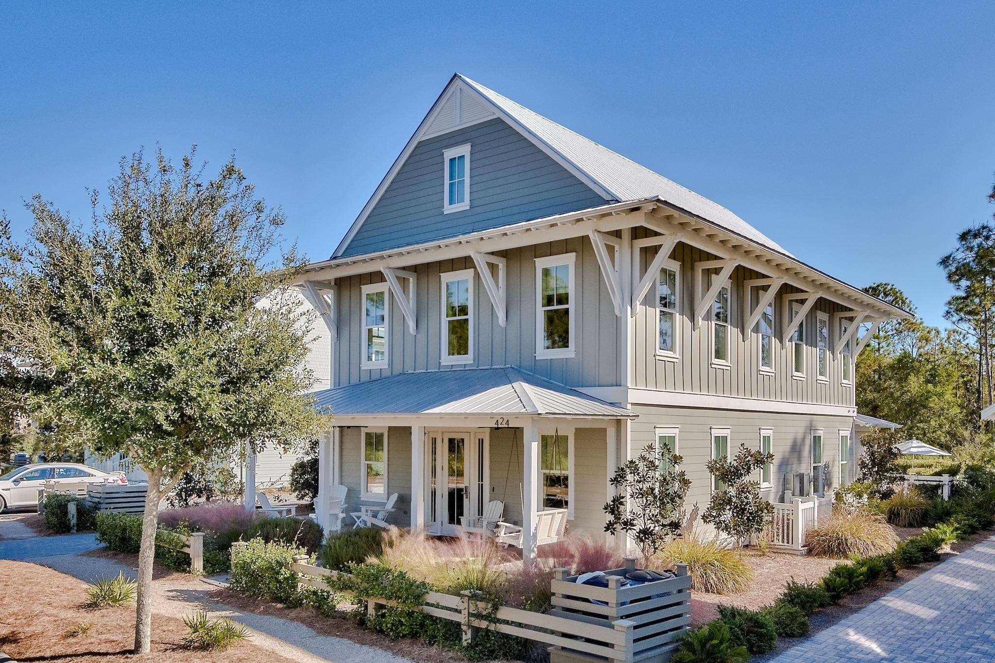 Luxury abounds at this stunning two-story, 6 bedroom home in WaterColor. Constructed by Borges Brooks Builders, this coastal retreat boasts 2 living spaces, a separate carriage house, Sonos sound system, and a brand new game room. Featuring natural hardwood floors, high-end finishes, appliances, and custom tile throughout, this home has been meticulously maintained and is completely turnkey. Outdoors, you will find sweeping views of the state forest and an expansive private heated pool, screened-in porch, and ample room for entertaining. Enter the home through the welcoming front porch into the main living area with an open concept living space, soaring two-story vaulted ceilings, and a chef's dream kitchen. Quartz countertops and a large island allow for an aesthetically beautiful entertaining space, while Wolf and Subzero appliances make cooking a breeze.
On the first floor, you'll find a hallway half bath, a walk-in laundry room, and a master bedroom and guest room, each with spacious ensuite baths. The second level features a bonus living area, another master bedroom with a private bathroom, along with a kids bunk room and guest bedroom, which share a hallway bath.
The first floor screened-in back porch overlooks the backyard oasis complete with a substantial, heated salt water pool and a large travertine deck with plenty of room for lounging and dining al fresco. The two-car garage has been converted into a game room, complete with a Ping Pong table, Air Hockey, a TV, and a golf cart. Above the garage, you'll find a private carriage house with the same refined style and finishes you have in the main house. With a kitchenette, living room, private bedroom, full bath, and a washer and dryer, it is completely functional on its own. This stunning property checks every box for the ideal rental, and would also make for a perfect full-time residence.
