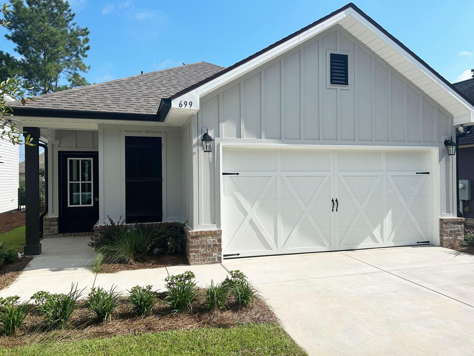 Awesome builder rate plus FREE front gutters. Restrictions apply.The EVERGLADES II J in Crescent Mills at Hammock Bay community offers a 4BR, 2BA, open design. Upgrades added (list attached). Features: double vanity, custom tiled shower with frameless door, and walk-in closet in master bath, kitchen island, pantry, covered rear patio, custom kitchen backsplash, crown molding, LED lighting throughout, smart connect WIFI thermostat, smoke and carbon monoxide detectors, landscaping package, architectural 30-year shingles, flood lights, and more! Energy Efficient Features: water heater, electric kitchen appliance package, vinyl low E windows, and more! Energy Star Partner.
