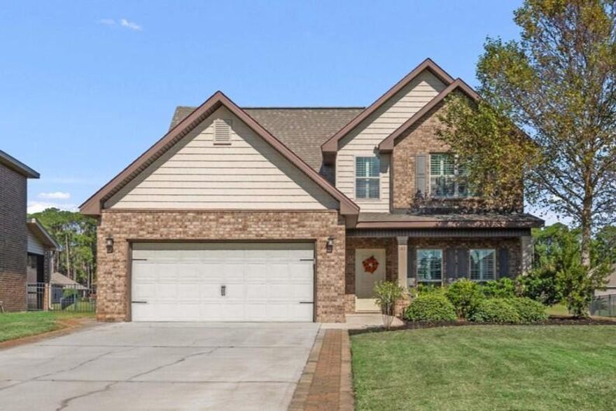 Welcome home to this beautifully maintained 3-bedroom, 2.5-bath residence with a HUGE bonus room, perfectly nestled in the heart of the sought-after Driftwood Estates community. Set along 70 feet of tranquil pond frontage, this home offers soothing water views and the kind of peaceful backdrop that instantly invites you to slow down and settle in.Inside, the home opens to a bright, airy open-concept layout where the living room, kitchen, and dining spaces flow effortlessly together--ideal for both everyday living and easy entertaining. The living room is filled with warm natural light, highlighted by hardwood floors, classic plantation shutters, and a ceiling fan, creating a space that feels both elegant and inviting. The kitchen serves as the heart of the home, featuring rich wood cabinetry with ambient under-cabinet lighting, granite countertops, stainless steel appliances, a pantry, and a generous island that naturally gathers family and friends. A charming window over the sink frames peaceful pond views, echoed by the sunlit dining area just beyond. A first-floor powder room adds convenience for guests.

Tucked away on the first floor, the primary suite feels like a private retreat. Crown molding adds a touch of refinement, while double windows overlook the rear garden and shimmering pond beyondperfect for waking up to gentle morning light. The en-suite bath offers spa-inspired comfort with oversized tile flooring, a granite double vanity, a walk-in tiled shower with glass enclosure, linen storage, a private water closet, and a large walk-in closet.

Upstairs, a truly expansive bonus room opens up endless possibilitieswhether you envision a cozy movie lounge, playroom, creative studio, home gym, or optional fourth bedroom. Two additional bedrooms are thoughtfully connected by a Jack-and-Jill bathroom, and the indoor laundry room is conveniently located nearby for everyday ease.

Step outside and exhale. The backyard is spacious, open, and beautifully fenced with sleek black powder-coated fencing, making it ideal for pets, play, or quiet moments by the water. The open patio with pergola invites relaxed evenings outdoorscoffee at sunrise, dinner at sunset, or simply enjoying the reflections on the pond. A covered front porch offers another welcoming spot to unwind, while the finished two-car garage, auto opener, and extra-wide paver-extended driveway provide both function and style.

Life in Driftwood Estates is about more than just a beautiful homeit's about the way the neighborhood feels. Tree-lined streets with street lights and sidewalks throughout make evening strolls and bike rides feel safe and inviting. Underground utilities add peace of mind during storm season. At the heart of the community is a massive park, where residents enjoy winding jogging trails, a children's playground, pickleball and tennis courts, shaded pavilions, and open green spacesperfect for weekend gatherings, morning workouts, or letting kids burn off energy. A community pool rounds out the amenities, creating a neighborhood that truly encourages connection and outdoor living.

Conveniently located near Sacred Heart Hospital, Publix, and the upscale shopping and dining of Grand Boulevard, this home offers everyday ease while remaining just a short drive from the sugar-white sands and emerald waters of the Gulf Coast.

Call 850-729-0399
View rental requirements or apply at www.RentwithBSR.com

No smoking or vaping. Pets may be allowed with some restrictions and a $400 non-refundable pet fee.
FEES: $50 per adult (18+) application fee; Landlord Liability Policy (if proof of Renter's coverage is not provided) $15/month; Pest Assurance pest control policy $20/month.