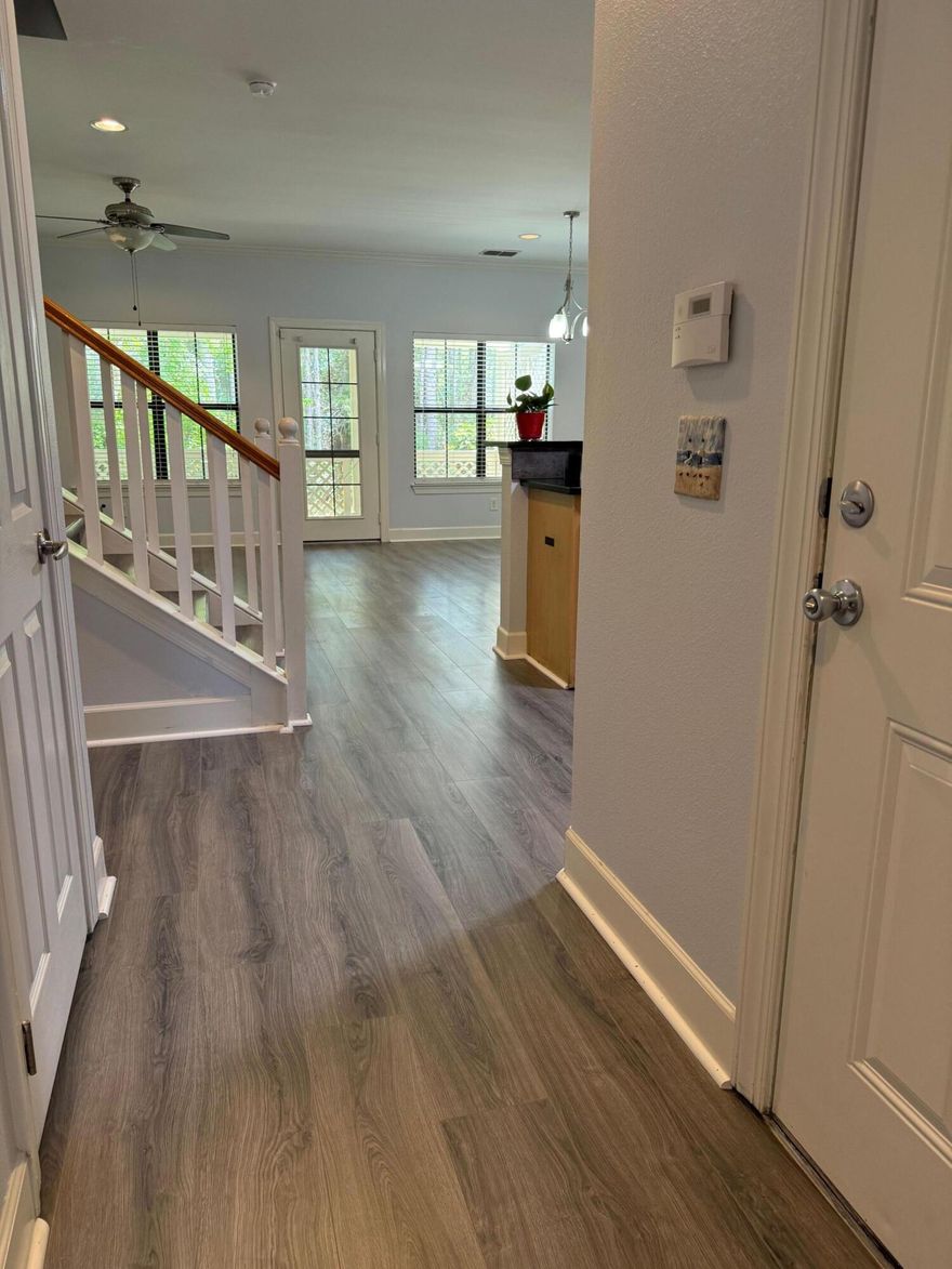 REDUCED $15,000.  Just REMOVED OLD kitchen and foyer TILE and Replace with it with Water Resistant Wood Plank Flooring  flooring. Amazing Location!  3 Bedroom 2 Full Baths 1 Half-Bath 1 Car Garage 1,649 SF on South Side of 98  in  Santa Rosa Beach, Florida!!!! Are you kidding me? HOA fee is $211.60 per month paid quarterly. LOWEST PRICED South of Highway 98 by the Emerald Coast Scenic 30A corridor offering activities, jobs, shopping, live music, dining, beach activities, hiking and biking trails, fishing, parks, state forests, and the world's most beautiful beaches.  Fresh Paint, NO CARPET😊, granite, stainless steel appliances, high efficiency HVAC (2017) and Hot Water heater (2023) and Community POOL! The covered back porch provides privacy overlooking a small stream and green forest. This well-maintained townhome is an affordable, low price If you are looking for a primary residence, second home, or income producing property (7 month minimum) look no further. Lowest priced unit, lowest HOA fees, low taxes and BEST location. WOW!  Call or TEXT to see for yourself.  It won't last long at this bargain price.