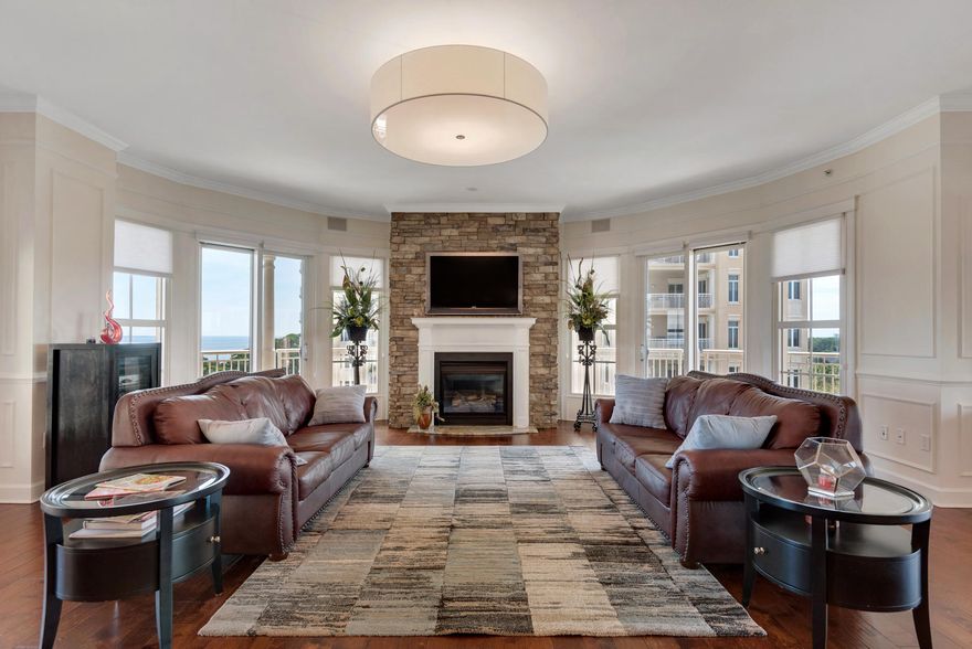 This beautiful Castleton 3 bedroom, 3.5 bathrooms with large study unit has expansive views of the Choctawhatchee Bay, two-tier pool and hot tub, the Mid-Bay Bridge, night lights of Destin Commons and the Signature 4 th hole on the world-class golf course at Kelly Plantation! This unit is spacious and open, with brand new upgraded hand scraped birch floors, classic wanes coating detail, beautiful upgraded light fixtures, custom cabinetry, stacked-stone fireplace with custom slab granite hearth on the floor and mantel in the Great Room, stacked-stone kick area on the breakfast bar, stacked-stone in the Master Bath with extensive mirrors, granite countertops, travertine, Viking appliances including ice maker and wine refrigerator and a huge wrap around balcony complete....see more.