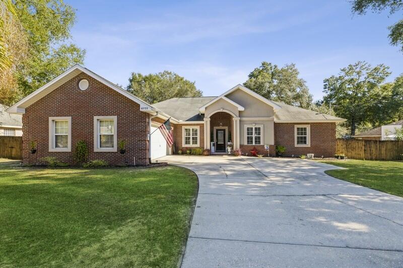 Amazing location South of I-10, this beautiful home is well appointed. This home features a spacious kitchen with lots of counter space, a center Island and a breakfast bar perfect for entertaining. The large master suite features a bathroom with double sinks, a soaking tub and a seperate shower as well as a huge walk-in closet. There is a bonus room that could be used for a fourth bedroom as there's plenty of room to add a closet. Fully fenced backyard feautures a deck and has a double gate and space for storing a boat or RV. Convenient to 7th Special Forces Group and Duke Air Force Base. New roof included. Don't miss your chance, call to see this gorgeous home!