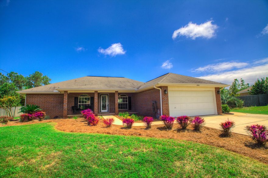 Amazingly kept home in the highly desirable Foxwood Subdivision in Southwest Crestview. The home lives large with vaulted ceilings, open breakfast bar, and eat-in kitchen. The open floor plan has large tile laid diagonally throughout the main living area and custom tile work in foyer and kitchen area. The kitchen has ample room for cooking and is accompanied by stainless steel appliances. The master bedroom has French doors leading to the open and private deck. The split floor plan is ideal for most families; on the opposite side of the master suite are two additional bedrooms and full bath, along with laundry room. Upon entering the backyard, you will notice the oversized, private, level back yard with 6 foot privacy FENCE, PATIO, DECK and BASKETBALL COURT!