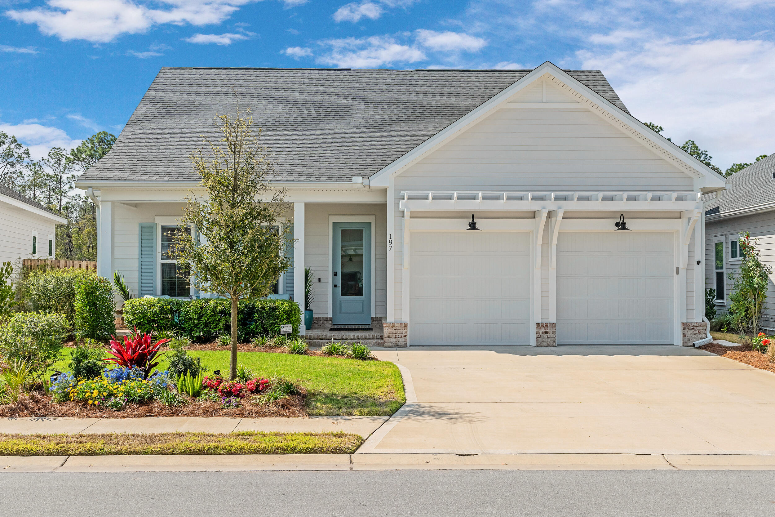 Welcome to the Longleaf Park neighborhood in the highly sought-after Watersound Origins community. This stunning home features three bedrooms, two and a half bathrooms, and a two-car garage. The Bella XL Floorplan, open-concept design is highlighted by 10-foot ceilings and an expanded back porch, offering ample space for relaxation and entertainment. Inside, you'll find top-quality finishes such as quartz countertops in the kitchen and bathrooms, stainless steel appliances, and a stylish tiled backsplash. The wood cabinetry includes soft-close features, and the home is further enhanced with crown molding, ceiling fans, and recessed can lighting throughout. Additional upgrades include a tankless water heater, an extended kitchen island, under-cabinet lighting, Epoxy coated floors in the garage, seamless gutters and premium Bosch appliances.
Both the pantry and closet systems have been upgraded for maximum efficiency, while a rear privacy fence ensures a peaceful and private outdoor space. The screened back porch, located just off the living room, is perfect for enjoying quiet moments or hosting guests. There is also large rear screened patio enlarged by 50'.
Longleaf Park is ideally situated near the front of the community, just a short golf cart ride to the beach and offering convenient access to a range of amenities. The property sits on an oversized pie-shaped lot with upgraded landscaping and lighting, backed by a serene nature preserve. Residents enjoy a wealth of exceptional features, including access to the Village Commons pool, fitness center, sports courts, and scenic nature trails. With unlimited golf and plenty of green spaces, outdoor activities are at your fingertips. The newly developed Watersound Town Center, just steps away, provides added convenience with a Publix Super Market, a variety of restaurants, and healthcare facilities.
This home offers the perfect blend of luxury, comfort, and convenience in one of South Walton's premier neighborhoods.