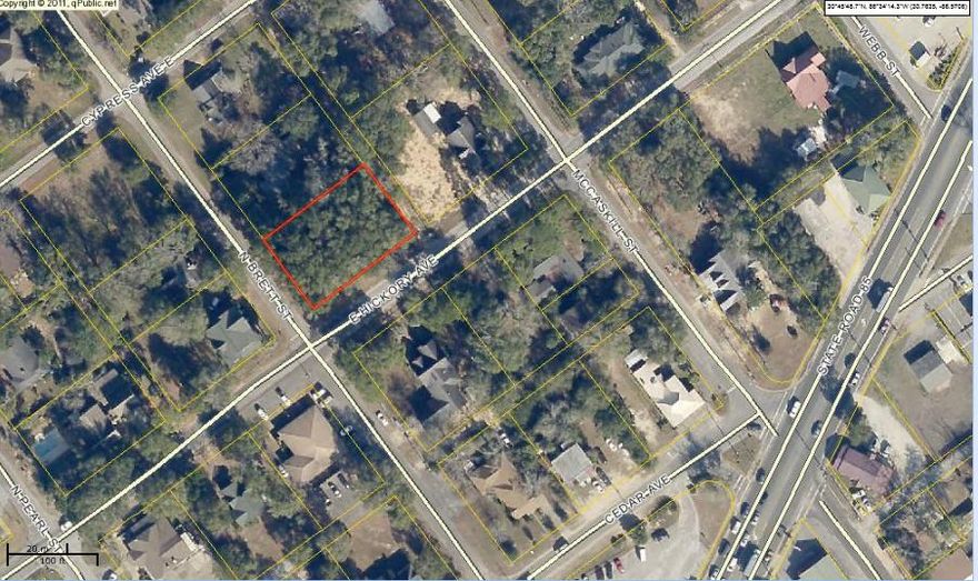 Rare corner lot with frontage on N Brett st and E Hickory Ave in an area of the city with commercial development one block from Highway 85. The lot is currently zoned residential, but according to city hall, it can easily be re-zoned commercial. Lot has large beautiful trees, frontage on 2 city streets.