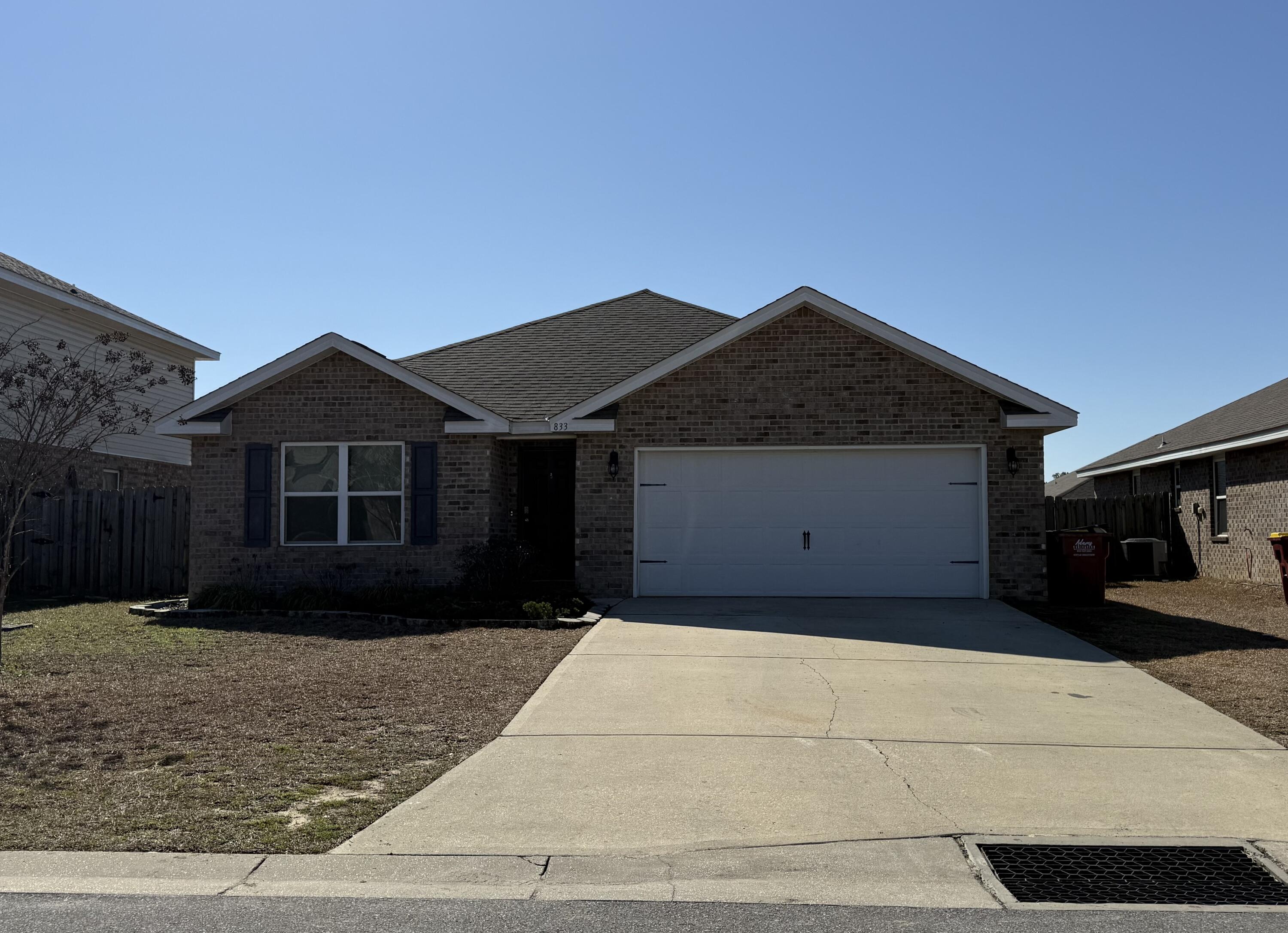 All brick 4 bedroom 2 bath home is waiting for you. A few of the features of this home include Community pool, dog park, Cover back patio, 2 car garage, small fire pit, and a privacy fence around back yard. LVP throughout the main living area and large suite. The kitchen come with lots of cabinets for storage, stainless appliances, large pantry and a small breakfast bar. Nice split bedroom plan. Large walk in closet in the large bedroom suite. Bathroom comes complete with double vanity and a combination tub shower. The other 3 bedrooms are carpeted. Hurry this one won't last lone.