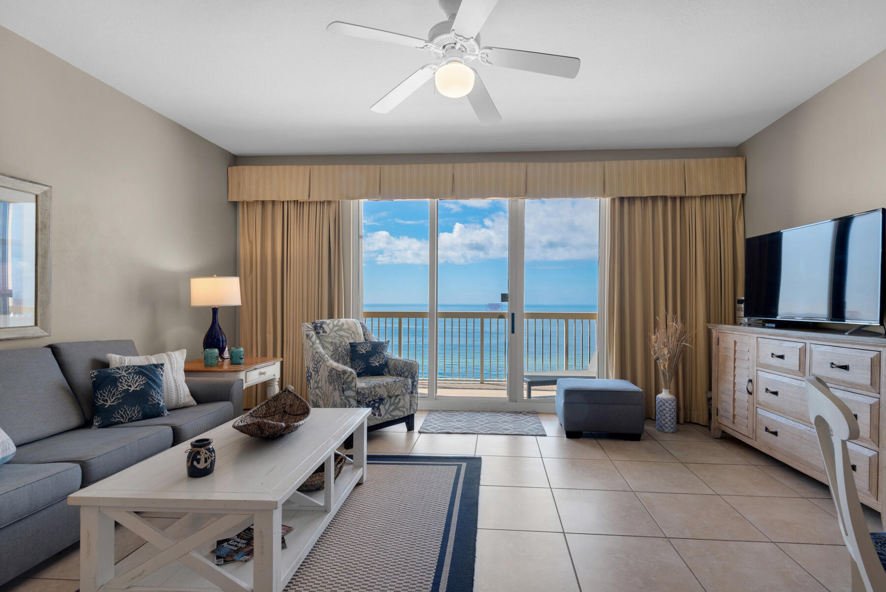 Under Contract - Accepting backup offers! Wake up to spectacular views every day from this immaculate 1BR/2BA + bunks condominium in the luxurious Calypso Resort & Towers on the coveted west end of Panama City Beach. This 14th floor residence has been updated with fresh paint, new lighting fixtures, new cabinets, a subway tile kitchen backsplash, new patio furniture, and a newer HVAC system. The open living and dining area overlooks the gulf front balcony with stunning views of the beach, emerald gulf waters, and the Panama City Beach City Pier. The kitchen features ample white cabinetry, a breakfast bar, and granite countertops. The cozy master suite has trayed ceilings and a private ensuite bathroom. Hallway bunks, a guest bathroom, and a sleeper sofa provide space for children or additional guests.
Located directly across from shopping and entertainment destination Pier Park, this condominium is a popular vacation rental with an excellent rental history. Calypso Resort & Towers offers two resort-style swimming pools, one heated during winter, a gulf front Tiki Bar, private beach access, a fitness center, resort parking, and beach chair service. Dining and shopping are all within walking distance at Pier Park with 130+ choices including a movie theater and amusement rides while the Frank Brown Sports Complex with playground, pools, and more is minutes away. Enjoy all that Panama City Beach has to offer from this turnkey opportunity!
