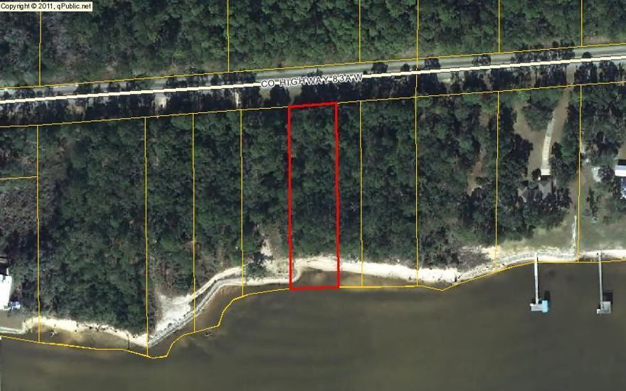 How would you like to wake up to this view every morning? This Gorgeous Bay front lot is a rare find. The lot sits on a high bluff giving you protection from the storms and has sandy shoreline beach for your enjoyment on those nights you want to watch the sunsets. Property has native hardwoods that will allow you privacy and shade. Is this what your looking for? Come and see!!