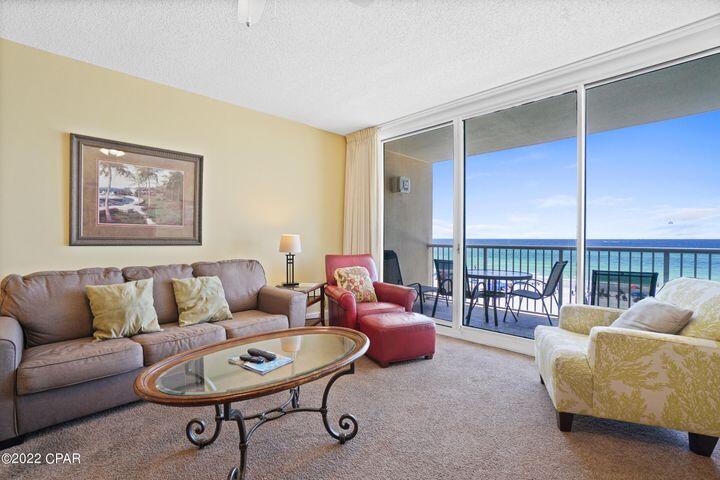 DEEDED PARKING SPOT INCLUDED IN SALE! Majestic Tower 2 UNIT 307 is the beach getaway you have always dreamed of - a beach inspired 2/2 Gulf front condo at Majestic Beach Towers! Outstanding convenience! Perfect 3rd floor elevation is the same floor at the sky bridge from the parking deck! Never have to touch an elevator to access this excellent low floor condo! Conveys with private deeded parking space # 424. Park next to the unloading area and walk over the bridge to this unit. Riveting Gulf views from the generous balcony, living room, and kitchen are framed by very attractive, seaside inspired interiors with comfort and style in mind. Sunshine and warm gulf breezes abound from the large balcony - enjoy sunrise views in the morning and Sunset views in the evening