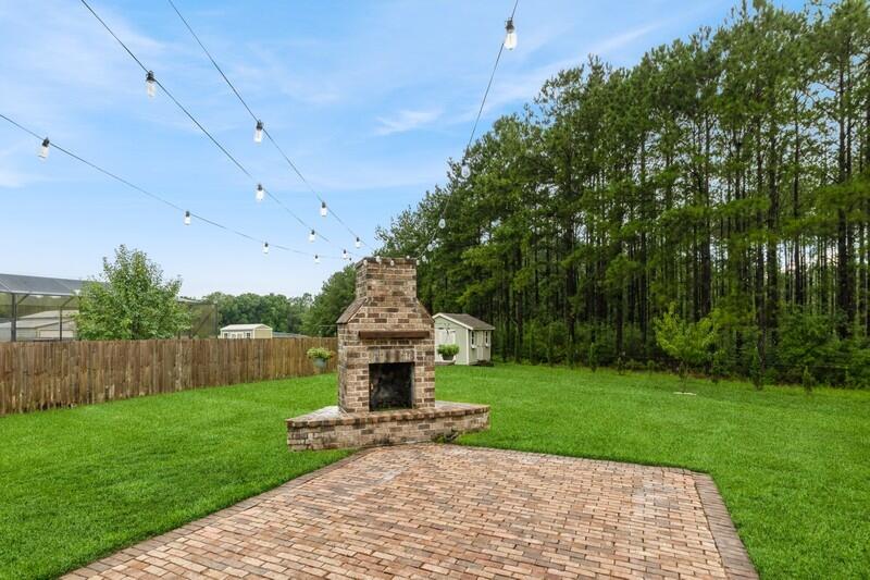 LISTED AT APPRAISED VALUE. Spacious 5BR/3.5BA traditional-style home in desirable North Crestview on a 0.56-acre lot closest home to Garden City Park, visible from your front door which has new playgrounds! This two-story gem features a formal dining room, office, and media room. Kitchen includes island, stainless appliances, and overlooks the family room with wood-burning fireplace. Rustic wood flooring throughout. Master suite offers trey ceilings, walk-in closet, garden tub, and separate shower. Upstairs: 2BRs, full bath, media room. Enjoy the brick patio with fireplace, mature trees, and built-in basketball hoop. Extras: 2 AC units, 2 walk-in pantries, built-in bench, low HOA ($200/yr), public water, septic, electric, fiber internet