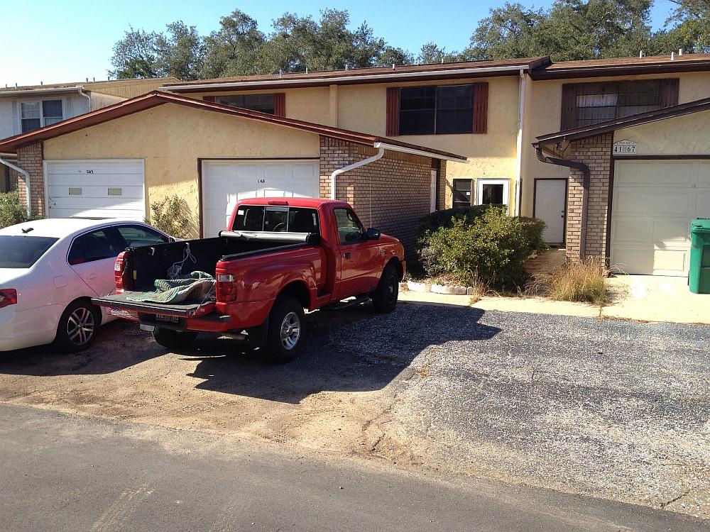 Ideal location for anyone stationed at Eglin Air Force Base! This spacious three bedroom, two and a half bath townhouse has storage space for days. Start with the good sized single car garage with workbench, enter into the house to enjoy the large living room, large laundry room, wrap around kitchen, two pantries, and a half bath. Out back you'll find another storage room and the undefined back yard that opens into a huge grassed common area. Upstairs is one small bedroom, another good sized bedroom, a shared full bath and a huge master bedroom with its own private full bath.Cable ready, Microwave, Air conditioning, Refrigerator, Dishwasher, Walk-in closets, Balcony, deck, patio, Garage parking, Laundry room / hookups, Oven / range, Heat