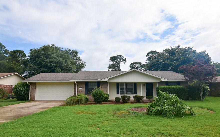 Beautiful golf course home with a pool! Located on Shalimar Pointe Golf Course this home is close to military bases and the amazing beaches of the Emerald Coast. You'll enjoy the open floor plan of the huge great room complete with gas log fireplace, adjoining dining room, kitchen and Florida room. Wood and tile are featured throughout the living areas of the home as well as in the master suite. Plenty of windows create a light and bright environment and the large kitchen has custom white cabinets, silestone countertops, double ovens and a five burner gas cooktop. The Florida room has sweeping views of your backyard complete with gunite pool and hot tub as well as the Shalimar Pointe golf course. Your master bedroom is quite large and will easily accommodate large furniture. The adjoining master bath has a whirlpool tub and separate shower along with a walk-in closet. Three additional bedrooms are located on the opposite side of the house. You'll love the large living spaces, amenities, quality and location of this exceptional home.  Schedule your showing today!