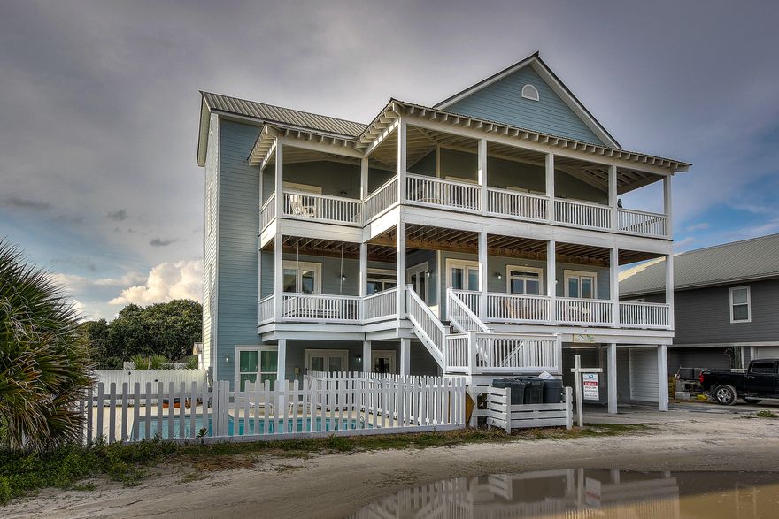 Spectacular gulf views from this spacious 6 bedroom, 5 1/2 bath home in Grayton Beach. Beautiful interiors with living, dining, kitchen & guest bedroom on 2nd level. Two huge bunk rooms on 1st level. Master and three large bedrooms on 3rd level. Walk out to one of the large porches & enjoy the panoramic views of Grayton & warm gulf breezes. You will love the private pool which has recently been resurfaced. ''Conch Out'' is not currently used as a rental, but has a projection of $126k. Located just a short stroll to the beach & local restaurants, The Red Bar & Chiringo. This home is a Grayton Beach gem.