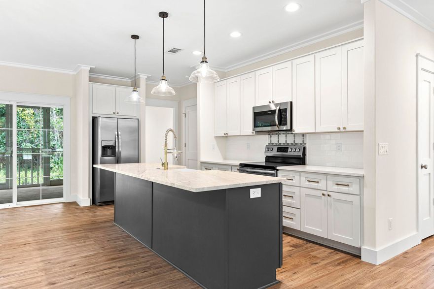 Move-in ready, new construction cottage located in the Magnolia Beach neighborhood of Pt. Washington. 107 E. Georgie is just a short stroll away from the Choctawhachee Bay and minutes away from biking/hiking trails, Scenic Highway 30A and the alluring beaches and attractions of South Walton. The home sits on an oversized lot featuring 3 bedrooms, and 2 full baths. The 1653 square foot cottage consists of an open floor plan with abundant natural light and modern finishes throughout. The kitchen features full overlay cabinetry, large kitchen island, farmhouse sink, stainless steel appliances, and custom subway tile backsplash. Notable highlights include dual vanities in Master Bathroom, custom Spanish tile flooring, floor to ceiling tile in the bathrooms, and large screened-in back porch.