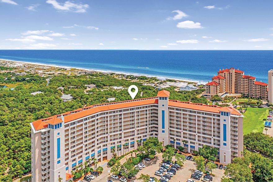 Situated in a 52-acre gulf-front resort, this light-filled and beautifully presented condo is in TOPS'L Beach & Racquet Resort, one of Fodor's top luxury tennis resorts. Gated, secluded and lushly planted, Tops'l is one of the Emerald Coast's hidden treasures. This bright, airy condo boasts panoramic views of the Gulf of Mexico and Topsail Bluff from the eighth floor of the Summit Building. The open floorplan has wood-effect flooring and a crisp linen white and ocean blue color scheme that creates a relaxing and inviting space for living and dining. The full-height sliding doors frame spectacular gulf views which can be enjoyed from both the living area and master bedroom, while the guest bedroom looks into the Choctawhatchee Bay. The wide balcony is the perfect spot for morning coffee with the sound of ocean waves and the perfect perch for cocktails and sunset views you'll never tire of. The white kitchen is fully equipped for full-time living if desired and includes a breakfast bar for quick snacks or chatting with the cook. Additional features include a deep tray ceiling and laundry closet with stacked washer/dryer. Two spacious bedrooms and two bathrooms, one en suite, round off the flawless accommodations. Tops'l's onsite amenities are equally outstanding with multiple dining options, world-class tennis club with 12 rubico clay courts, racquetball, putting green, a new state-of-the-art fitness center, weight room, sauna, steam room, yoga and fitness classes. There are multiple pools and 600 feet of private white sandy beach providing the perfect setting for swimming, sunbathing and sunset walks. Premier shopping is available nearby at Grand Boulevard and Silver Sands Outlets. This well-maintained and updated unit comes fully furnished and turnkey for your next beach vacation, and is rental-ready with an excellent booking history and solid 5-star reviews for those looking for an investment property.