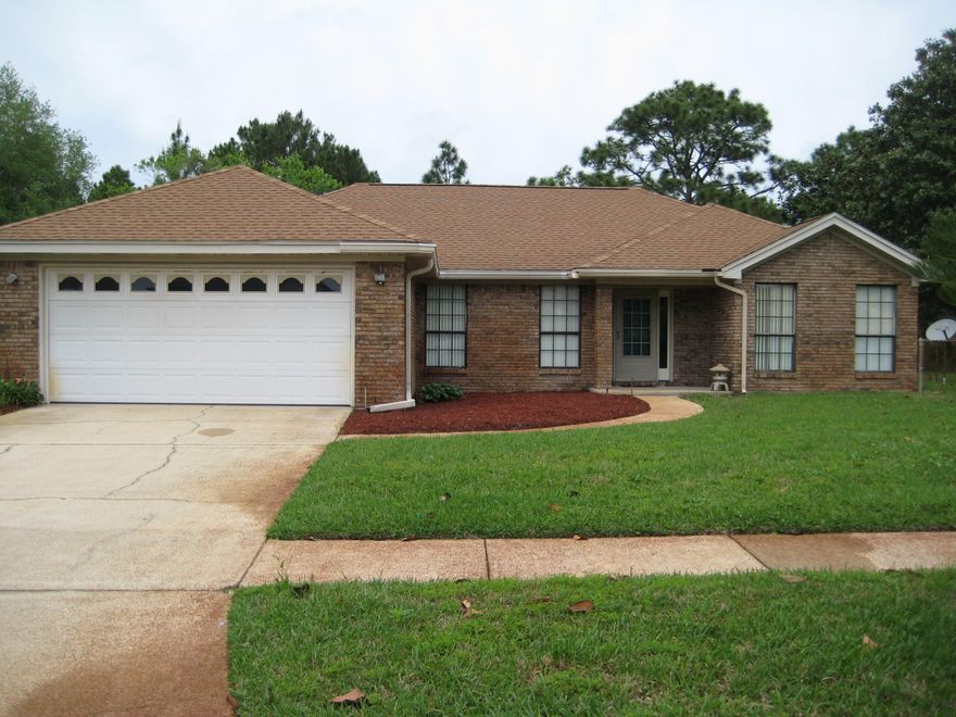 ***HOME WARRANTY INCLUDED*** Welcome home! This lovely brick home is close to bases, beaches, shopping, and more. Enjoy your quiet retreat at this home that backs up to the base while sitting in your own Florida room. This well-maintained home features a kitchen island with a breakfast bar for getting ready for your day or just relaxing with friends. Freshly painted! Enjoy the fireplace, the spacious bedrooms, skylight, new fixtures, fully fenced backyard, and more. Ready for you to move in now!