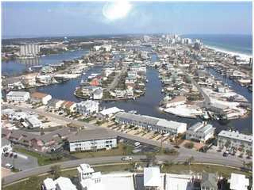 This lot is ready to build on. Water and Sewer Taps paid. Plenty of elevation. Brand New Seawall and two 40 ft. boat slips in place. Absolutely the best waterfront value in Destin.