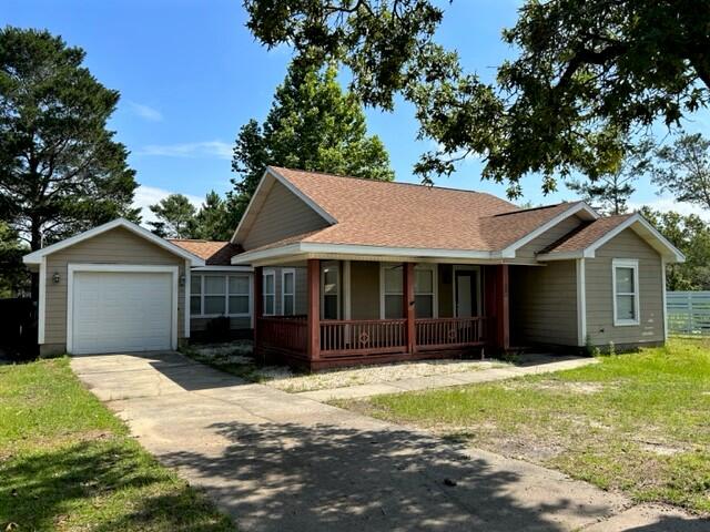 Located in Oakwood Hills and only 5 miles from the interstate exit at Mossy Head or 7.5 to 331 Hwy in Defuniak Springs. This house is a rare find! Situated on a paved road with beautiful trees and easy access. The lot is over sized with beautiful large trees for shade and an awesome wrap around front porch to enjoy. The backyard is fenced for your furry friends or for a large garden. The possibilities are endless. Take a look at the pictures of the well designed floor plan with master on one side and the two other bedrooms on the other. The master bathroom with clawfoot tub and separate walk in shower is impressive. Come see for yourself!