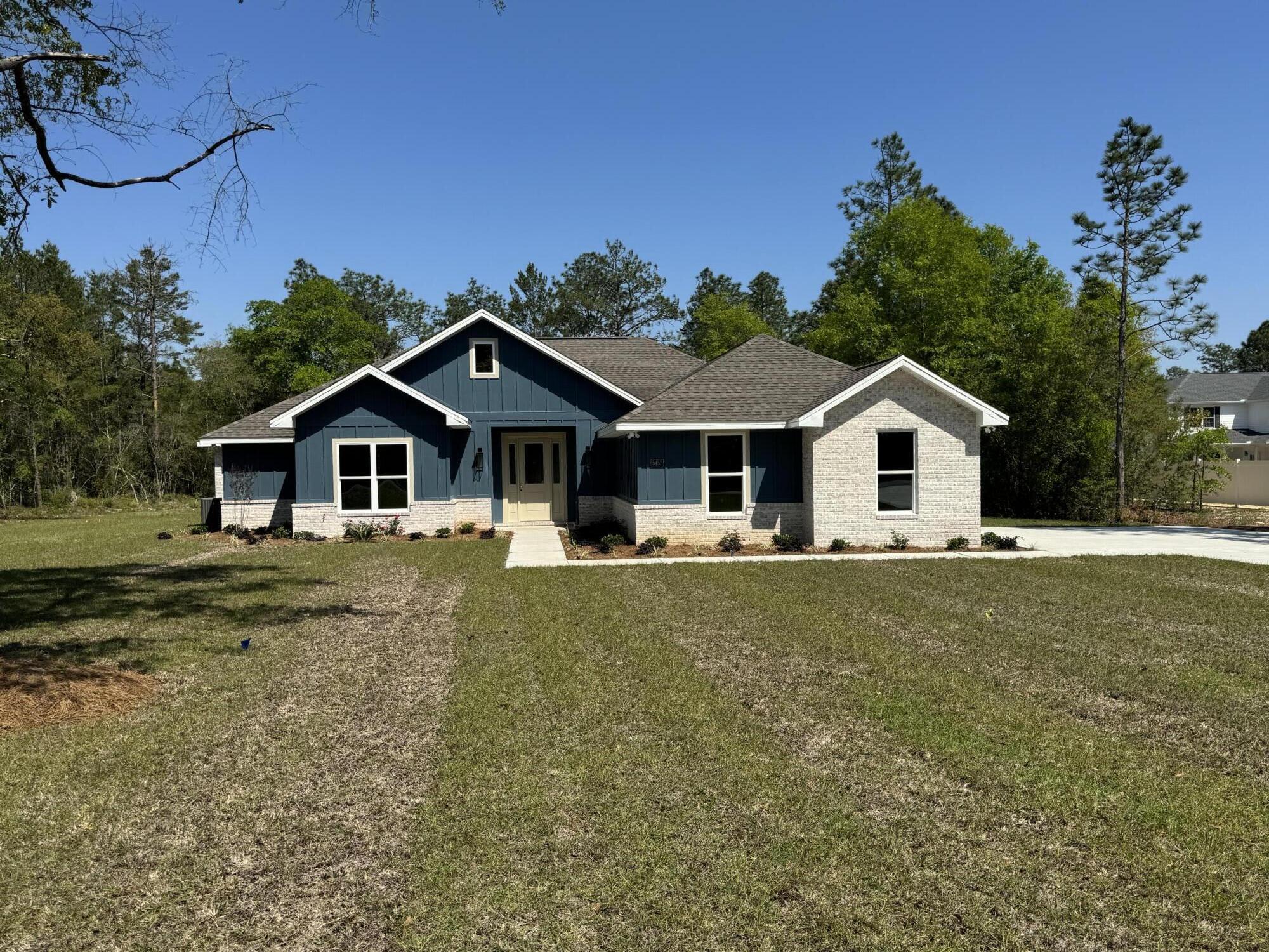 New Construction ready to move in, 4 bedroom 2 baths oversized 2 car garage on 1 acre.Builder thought of everything, 10-foot ceilings with trays in great room and master bedroom, both have rope lighting. Master closet has built in shelving with access to the laundry room. All cabinets are soft close, large, covered porch, oversized driveway, and sprinkler system,