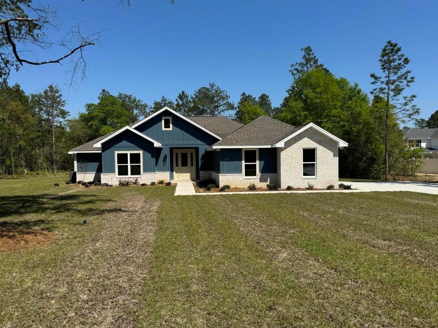 New Construction ready to move in, 4 bedroom 2 baths oversized 2 car garage on 1 acre.Builder thought of everything, 10-foot ceilings with trays in great room and master bedroom, both have rope lighting. Master closet has built in shelving with access to the laundry room. All cabinets are soft close, large, covered porch, oversized driveway, and sprinkler system,