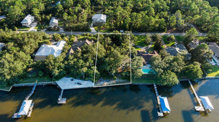 This beautiful bayfront lot has it all; enjoy breathtaking views of the Choctawhatchee Bay. Lot 12 in Hatchee Shores has 100 ft on the Choctawhatchee Bay with a NEW SEAWALL and DOCK in Place. Just minutes from 30A and the beaches of South Walton, located 1 1/2 miles from the 331 bridge on the quiet Nursery Road. Mature oaks give the appeal of Old Florida.  The Lot is 100 ft wide and 275 ft deep, with plenty of room to build your waterfront dream home. Spend your morning's kayaking or paddleboarding on the bay and your afternoons cruising the bay on the boat. The Lot offers one of the highest elevations and is situated within an X Flood Zone.
 It is close enough to Grayton Beach, Seaside, and WaterColor to take advantage of the restaurants and activities.
