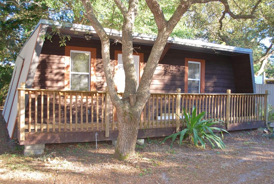 Perfect for Investors or a 1st Time Home Buyer. Close to Eglin and Hurlburt. This quaint cottage located between Hollywood and Brooks St has been updated with an all new bathroom, a new kitchen countertop and cabinets, new plumbing throughout, new windows and blinds, painted interior and exterior. 2 bedrooms, tile flooring throughout, plus utility/laundry room for additional storage and washer/dryer hook-up. Large yard - store your BOAT! Enjoy the quiet evenings or mornings on your front deck w/new railing. Large shaded backyard. Must see to believe!