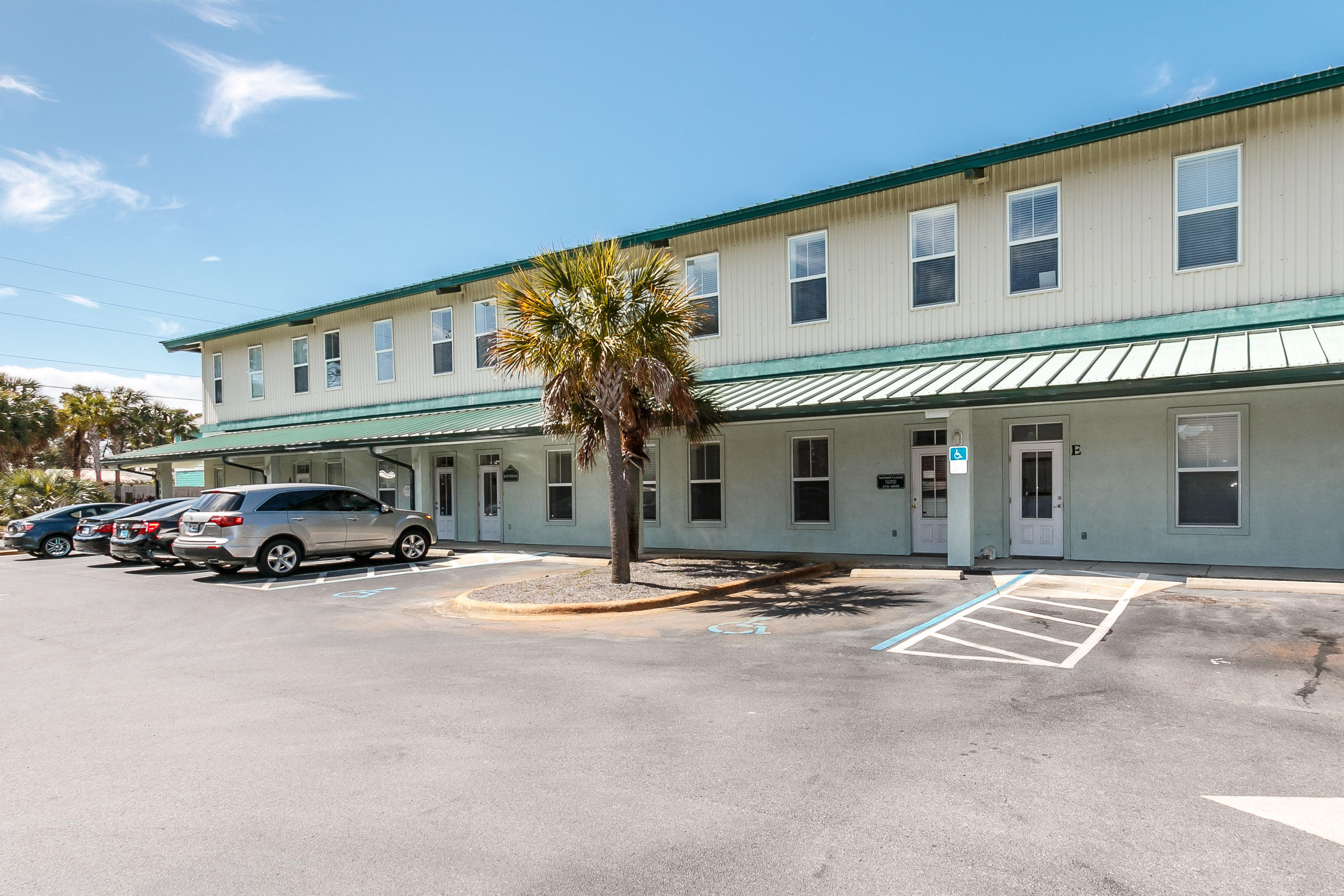 Take the opportunity to own a unique, quality office space that has high ceilings, multiple offices, conference rooms and a kitchenette. The unique feature of this business center besides being within a couple blocks of the beach is that it has a two car, spacious garage that is accessed at the rear of the building. Inquire with us about financing if interested.