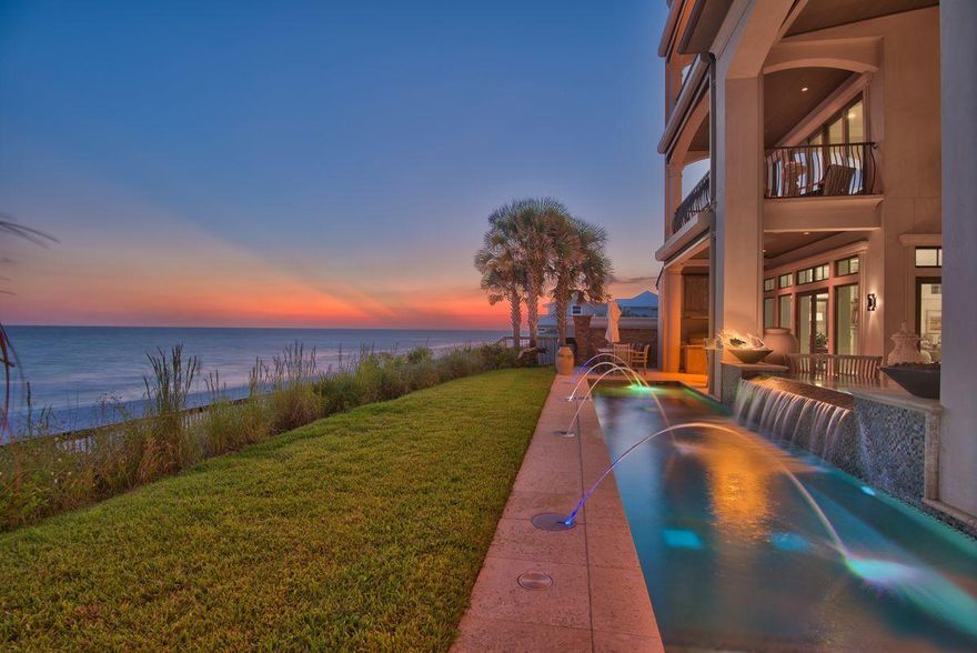 Nestled atop a pristine bluff on Blue Mountain beach and presiding over 75' of beautiful gulf frontage, this expansive coastal retreat exemplifies privacy with it's compound nature and palatial architectural design. The sprawling compound generously provides over 8,200 square feet of premium living space notably characterized by elevated engineering & superior building methods including brick masonry & stucco over insulated concrete which was completed by esteemed Davis Dunn Construction.