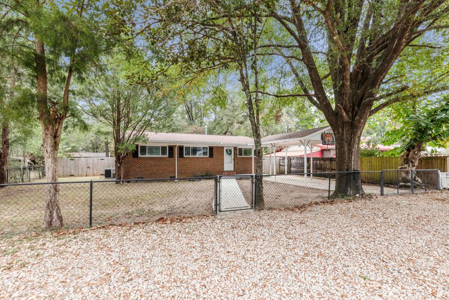 Don't miss out on this charming home within a short distance to twin hills park.  For the buyer's piece of mind this home has a BRAND NEW ROOF and HVAC is only a few years old. This home has 3 bedrooms, 1 full bath, and a half bathroom. It has a great eat in kitchen space and plenty of room to entertain. Enjoy the large screened in back porch to relax and take in the fall air. Plenty of parking in front of the home and large carport, new sidewalk leading to front door. This one won't last long!