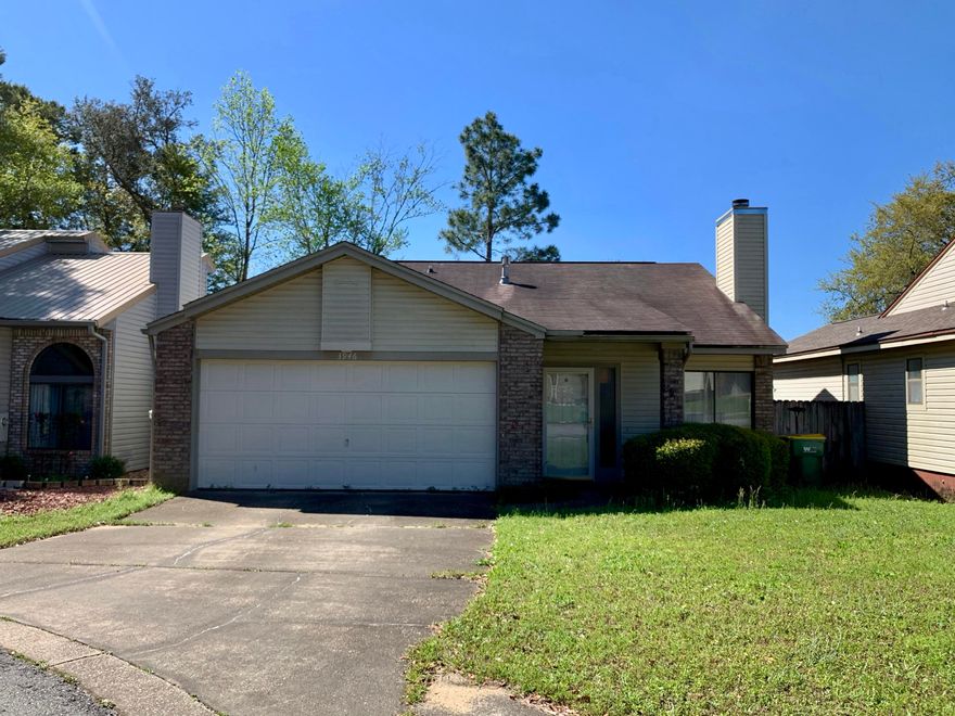This house is in such a convenient location in Niceville and boasts a large living, dining area, large kitchen with gas range, two bedrooms, two baths, nice two car garage with pull down stairs to attic storage. Comfortable screened in porch on the back of the home. Gas fireplace and vaulted ceilings in living room! This is a great home to either live in or use as investment property.