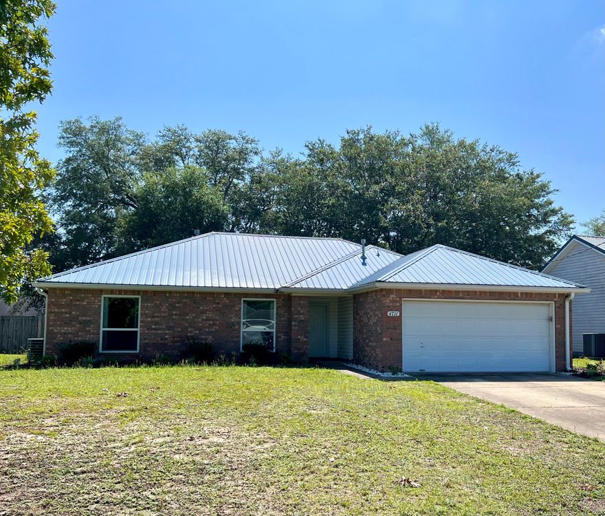 Perfect all brick starter home south of I-10!  This 3 bedroom 2 bathroom home has stainless steal appliances, vinyl plank flooring, granite countertops, screened porch, metal roof, and a fenced in backyard.  The gas stove, refrigerator, and microwave were all replaced in 2019, the roof was installed in 2010, the HVAC was replaced in 2012.  Do not miss your chance to view this charming home in South Crestview.