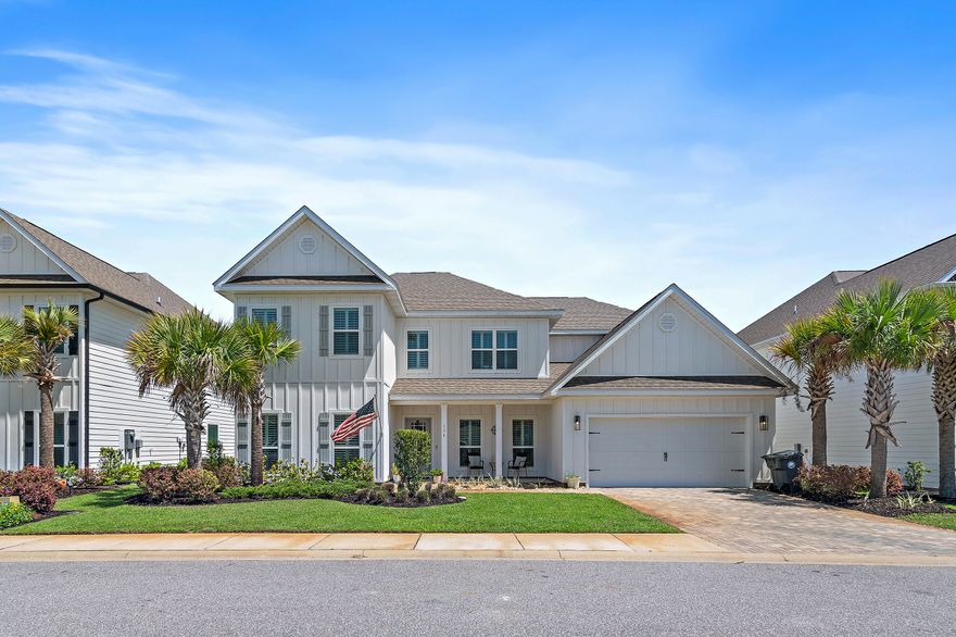 Welcome to your dream beachside retreat! Located just steps from the glistening shores, this exquisite Craftsman-style home offers an expansive 4,425 square feet of coastal luxury with many custom upgrades throughout. With six spacious bedrooms and four elegantly designed bathrooms, this residence provides ample space. Enjoy entertaining in two expansive living rooms, each offering ample space and comfort. The main living room is enhanced by large custom-built bookcases, creating a striking focal point and adding a touch of sophistication to the space.The chef-inspired kitchen is a culinary enthusiast's dream, featuring top-notch appliances and a spacious center island. High-end upgraded finishes adorn the island, countertops, and backsplash, complemented by ample storage. Each bedroom serves as a tranquil sanctuary, with the master suite offering a luxurious en-suite bathroom with a spa-like soaking tub and a roomy walk-in shower. 

Step into a world of imagination in one of the charming bedrooms, where a custom-built bookshelf doubles as a secret door, leading to a whimsical playroom. This hideaway offers the perfect escape for children to explore, read, and enjoy their very own magical space, making it a delightful highlight of the home.

Step outside to an enchanting private yard with stunning lake views. The spacious patio and built-in outdoor kitchen offer the perfect setting for entertaining and relaxing, making the outdoor space a true extension of the home's charm.

The finished garage boasts an epoxy-coated floor and a smart storage system, allowing for efficient organization and ample room to park two cars. Easily store beach essentials like boards, chairs, and bikes, keeping everything tidy and accessible.

Situated in a prime location, this Craftsman-style gem offers the ultimate in coastal living and luxurious comfort. 