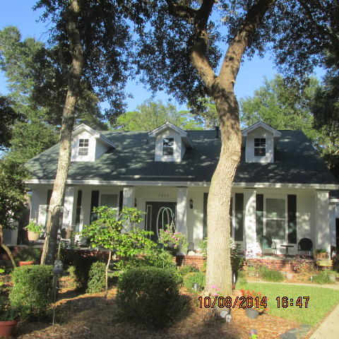 This home sits on one of the largest lots in Village of Bolton, cul de sac and backs to Eglin Federal Land. Walk in being welcomed by leaded glass front door with sidelights a wow two story foyer. Randy Wise custom built home with all the trim modeled by a home built at the turn of the century, tall baseboards, all doorways and windows trimmed,crown mold, yet all the modern conveniences. The kitchen was remodeled in 2008, so all kitchen appliances replaced at that time. All of the lighting fixtures fans, door hardware and exterior doors have been replaced. Bathroom plumbing fixtures replace. Roof replaced in 2005. The home has a freestanding wood burning stove sitting on an old Chicago brick hearth with brick mantle. Master bdroom and one more bedroom down stairs with two full baths.