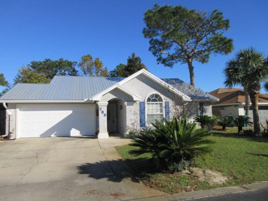 What a fantastic location for this 3 bedroom, 2 bath home that is south of 98 on 30A. Convenient bike and walking trails align the scenic road for all types of coastal enjoyment. The location is so close to the white sandy beaches of Topsail Preserve Park with its 3 miles of pristine, undeveloped beach! The home features vaulted ceilings, a gas fireplace, peaceful fenced back yard with 400 square feet of covered concrete patio for year round living and entertaining! What an incredible 2 car garage and the home has tile and the bedrooms have carpeted flooring and fresh paint . The beautiful stainless dishwasher, refrigerator and microwave are all only 6 months old! Wait that's not all....the metal roof and HVAC were both replaced in 2016!