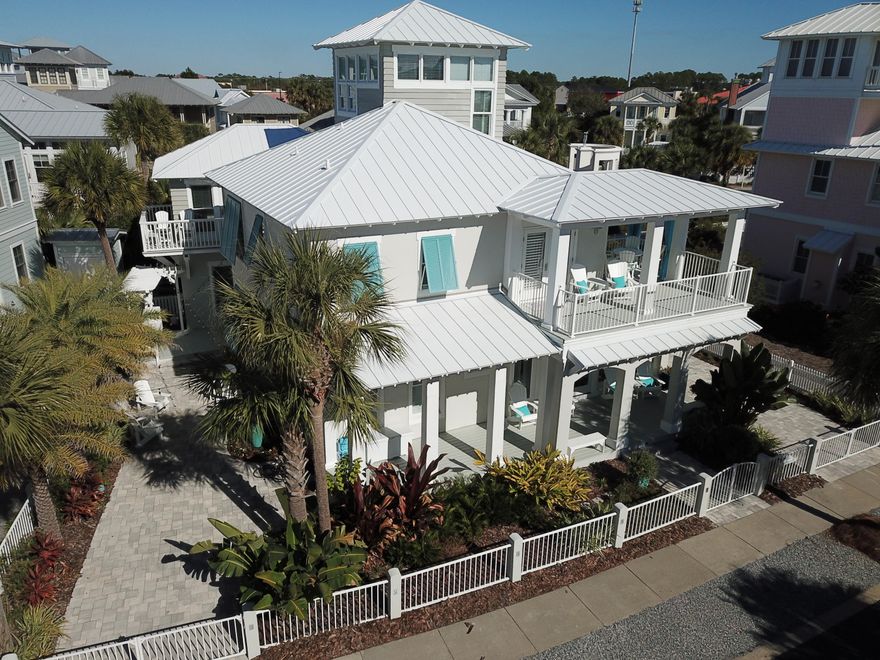 Contemporary decor meets coastal design in this completely renovated home located steps from the beach. Private pool, porches and outdoor kitchen provide spaces that everyone can enjoy. Renovation was completed in 2018 and includes redesigned kitchen with Viking appliances & quartz countertops, updated custom bathrooms, custom boat bunks, & other must see updates. Main house has 4 King ensuites and bunk room. Carriage house has 2 bedrooms and 2,5 bathrooms. Landscape features uplighting, Sylvester palms, cafe' lighting and fountain. The new saltwater pool has Laminar jets & lighting with a Heat Pump to heat & cool the water.Located in the gated community of Carillon Beach where the wide expansive beach has 8 walkovers, beach front pool, 2 other community pools and a lake to enjoy