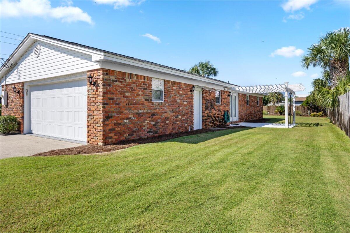 Marked below market value!!This inviting property is perfectly positioned on a beautiful corner lot, offering both privacy and an abundance of natural light. Imagine waking up every morning to the gentle sound of waves, with public beach access directly across the street, making your dream of beachside living a reality. This delightful home is ideal as a second residence or a vacation retreat, providing the perfect escape for relaxation and enjoyment. With no HOA restrictions, you have the freedom to personalize your space to suit your lifestyle. The surrounding area boasts vibrant local culture, fantastic dining options, and endless outdoor activities, ensuring you'll never run out of things to do. Schedule a showing today!